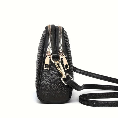 Cora | Bella mini borsa a tracolla in ecopelle con motivo coccodrillo