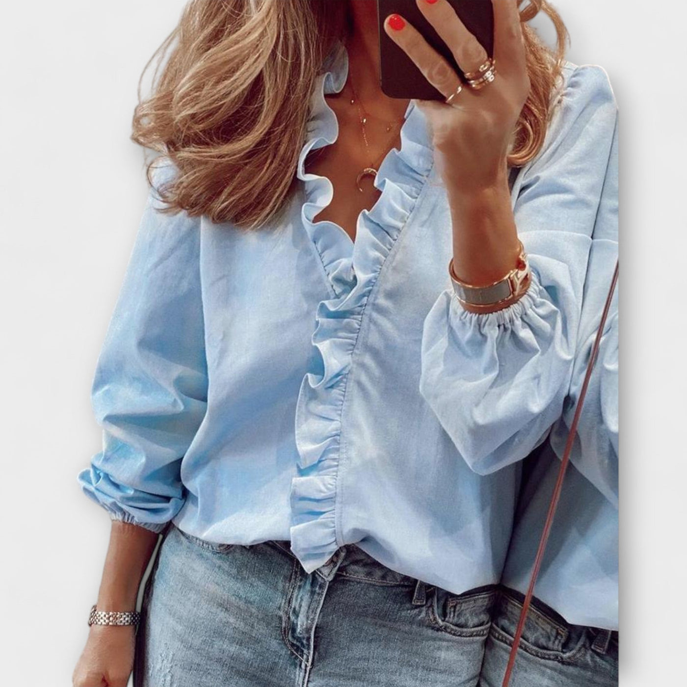 Castorini™ | Una Blusa Elegante